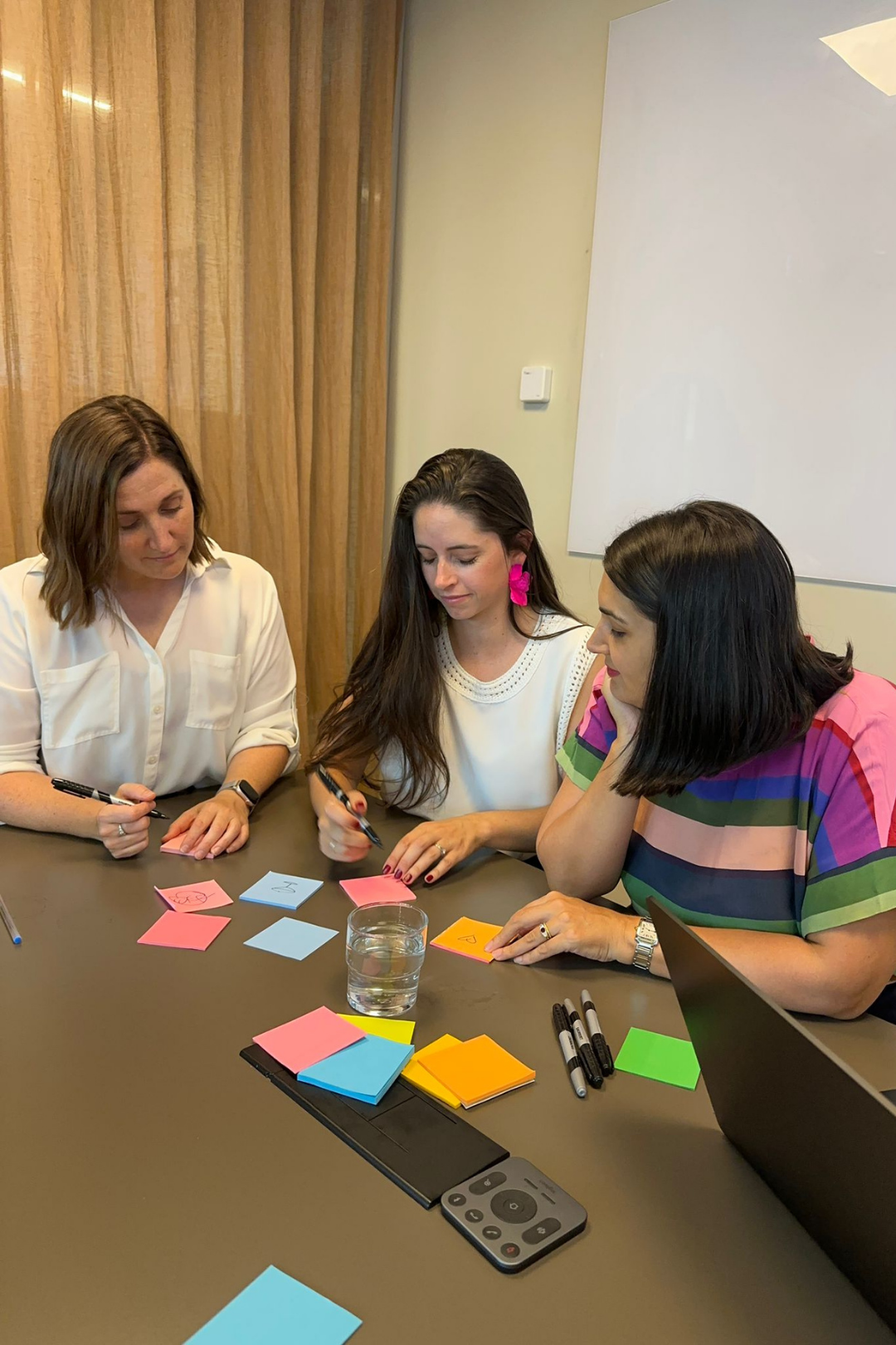 Catalina working with clients in a co-design session